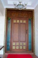 the main door with inlaid tiles.